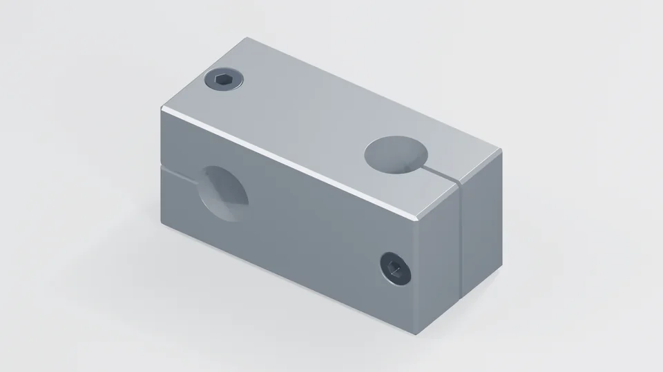 CAD-derived render from the original clamp geometry: Dual-axis split clamp